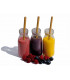 Bamboo straws in three aligned glass jars with smoothies