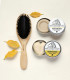Ecological gift set for women composed of a bar shampoo, a bar conditionner and a wooden hair brush