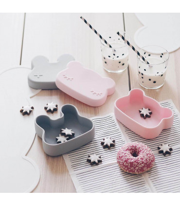 We might be tiny cat and bunny snackie silicone boxes on table with cookies